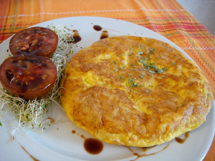 a plate topped with food and a fork