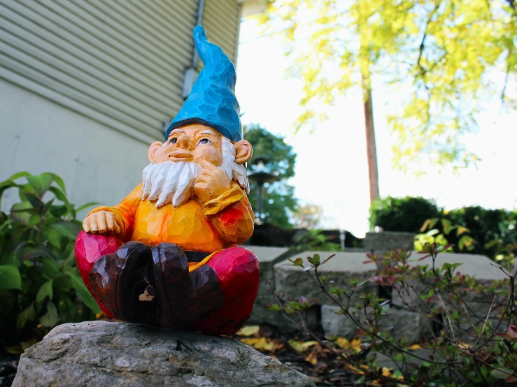 an image of a gnome statue outside