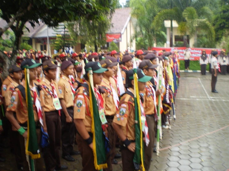 a parade of people dressed in military uniforms