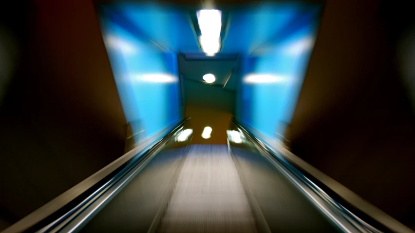 motion blur pograph of escalator in urban area