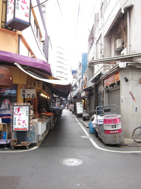 an oriental street is shown with a man in front