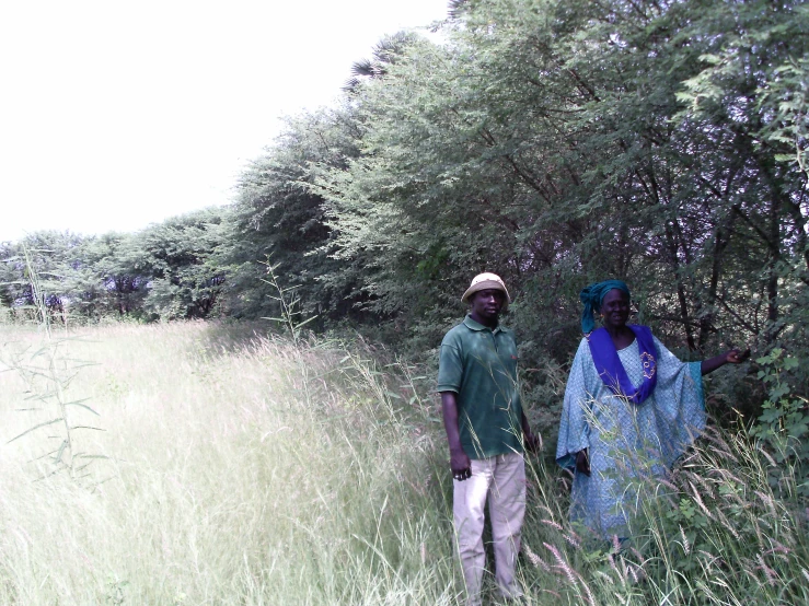 two black african american people in a field