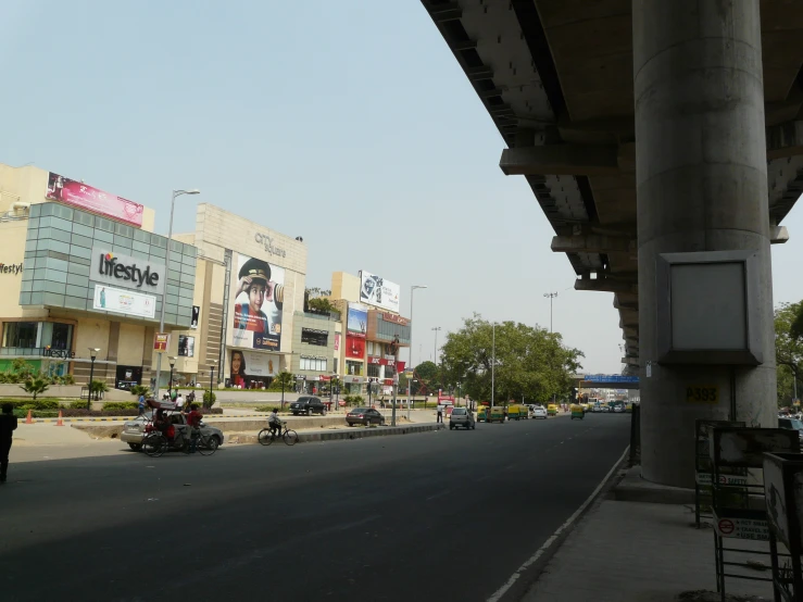 view from under a road with buildings on either side