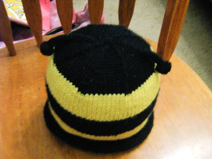 the hat is made to look like it's been knitted