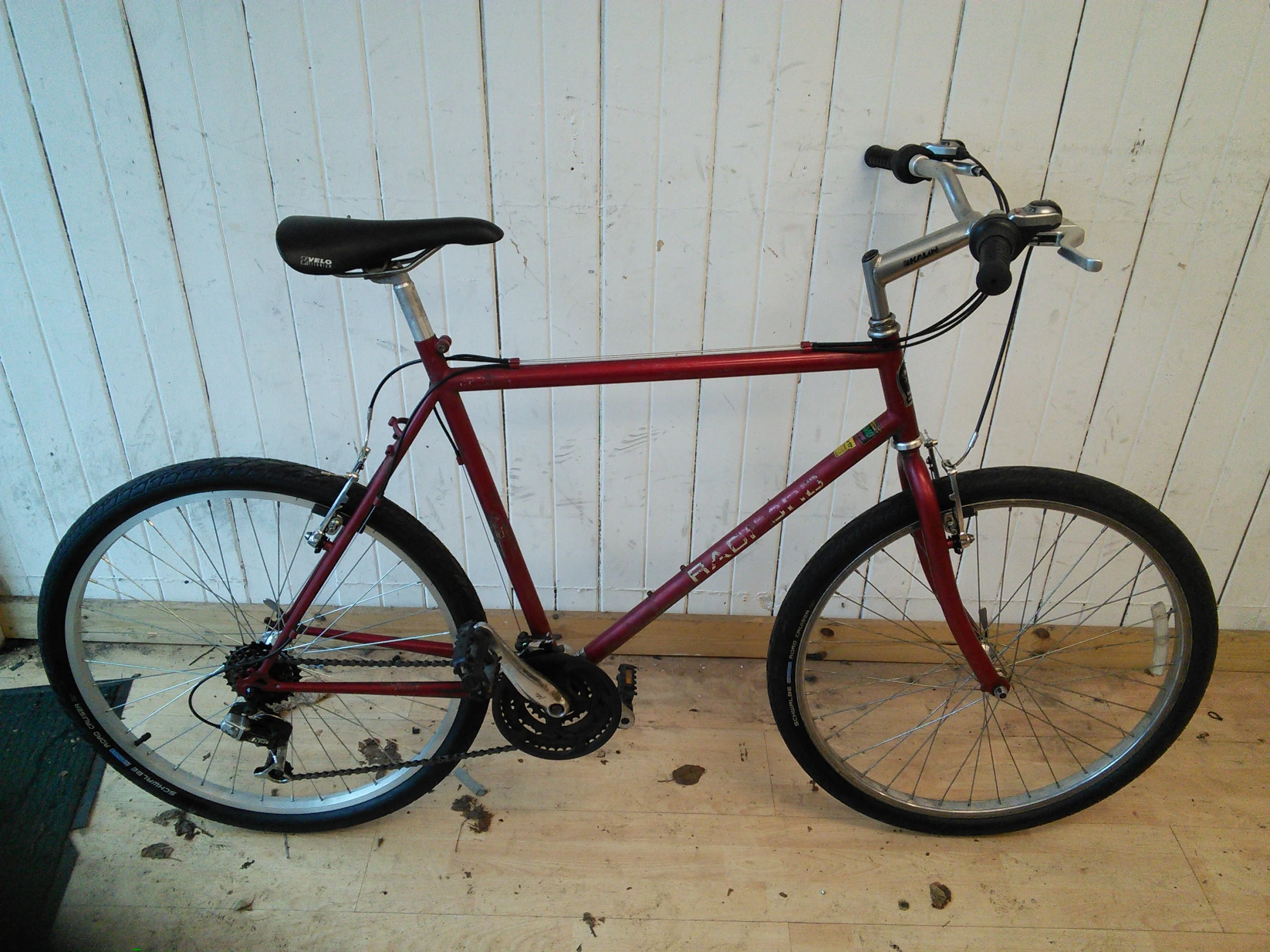 an old bicycle that has been repaired and cleaned