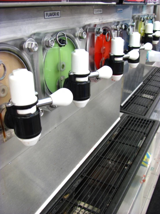 an automatic fryer filled with lots of different types of cooking equipment