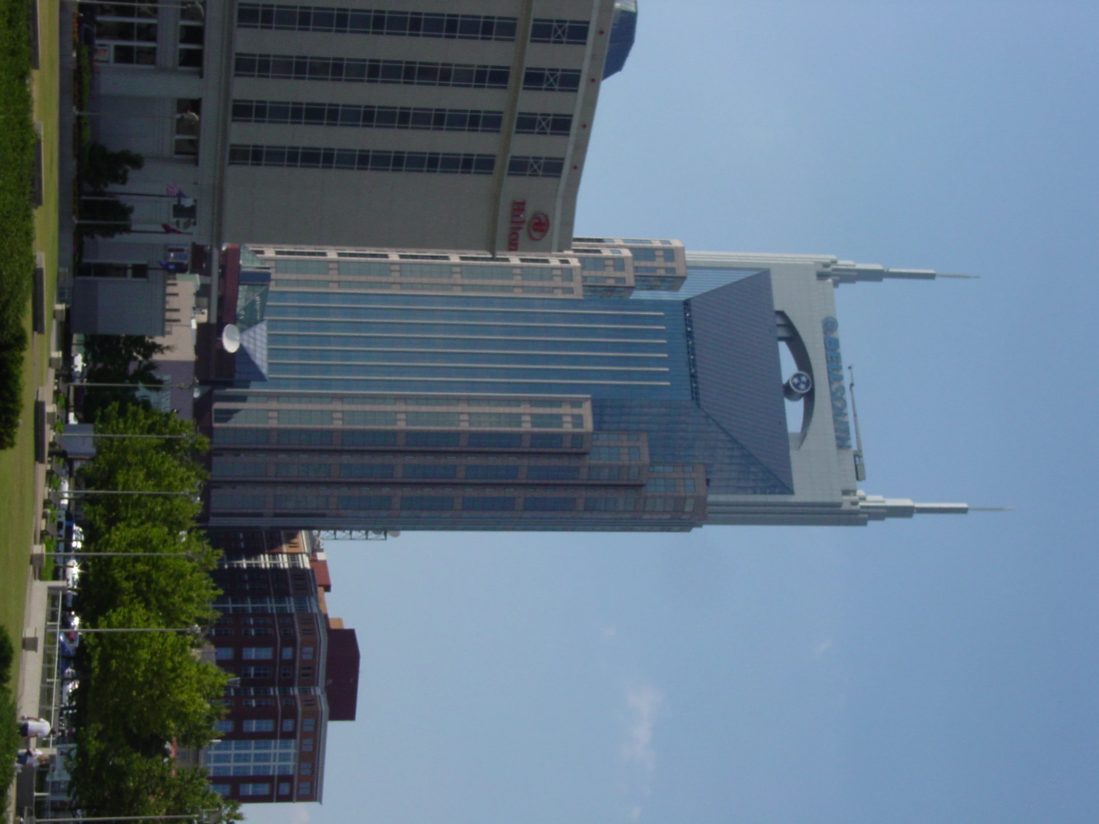 a large skyscr with a clock tower on it's side