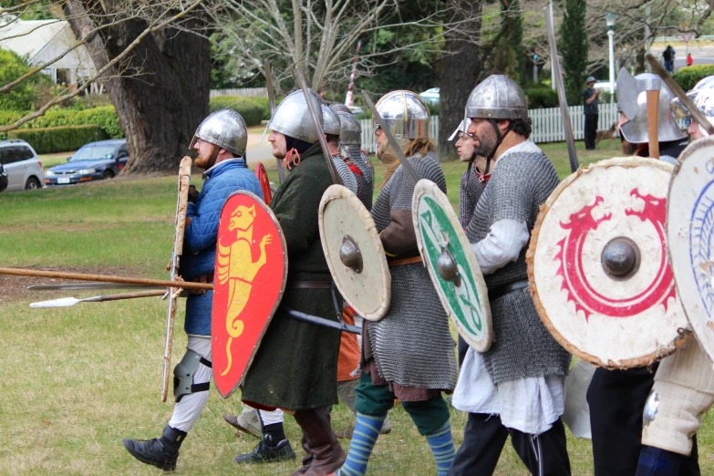 the men in a chain mail battle with armor and sword