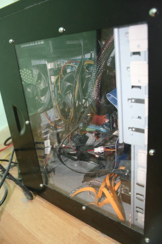 the inside of a computer, with many cables