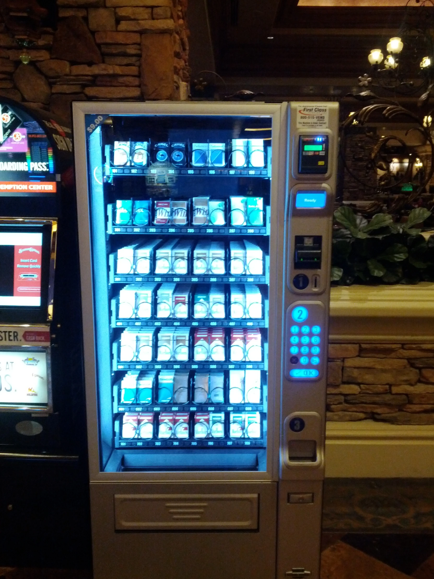 a vending machine in a restaurant that sells beverages