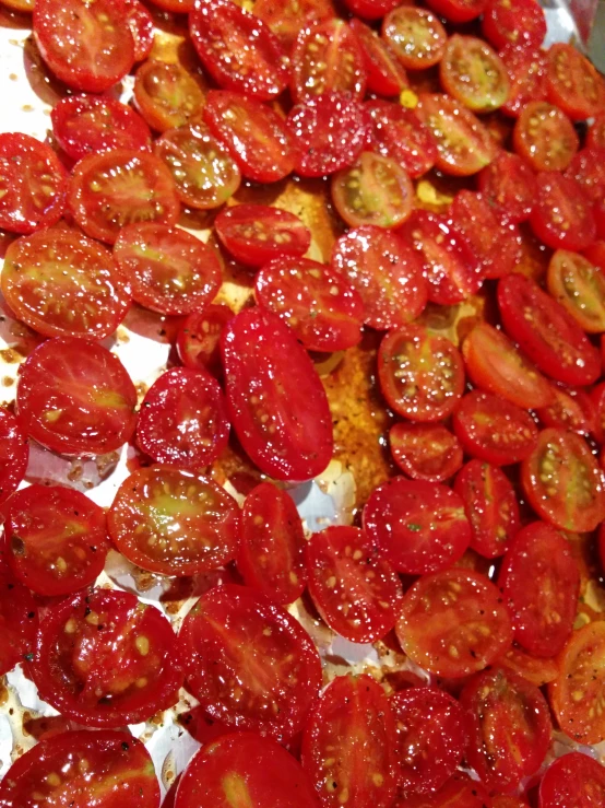 tomato slices on top of some bread and other ingredients