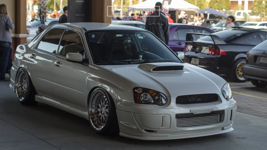 a subaru on some kind of car in a lot