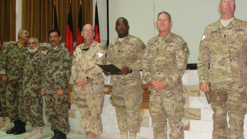 a group of soldiers standing in front of each other