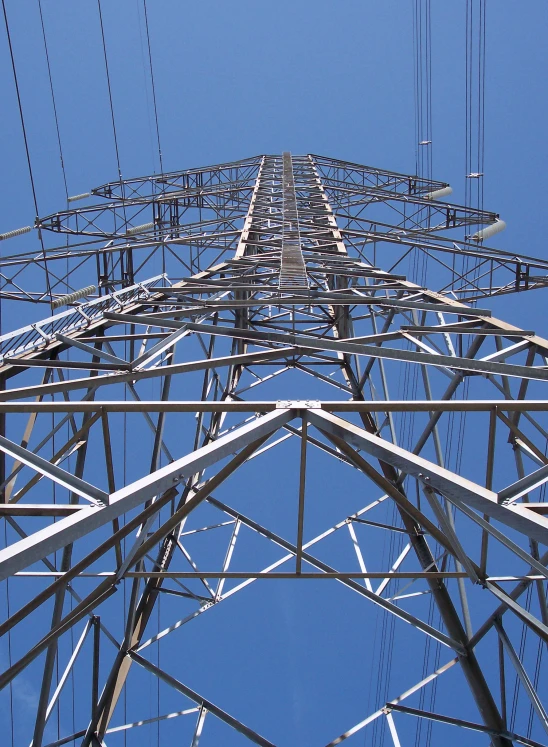 the view of a high voltage power tower