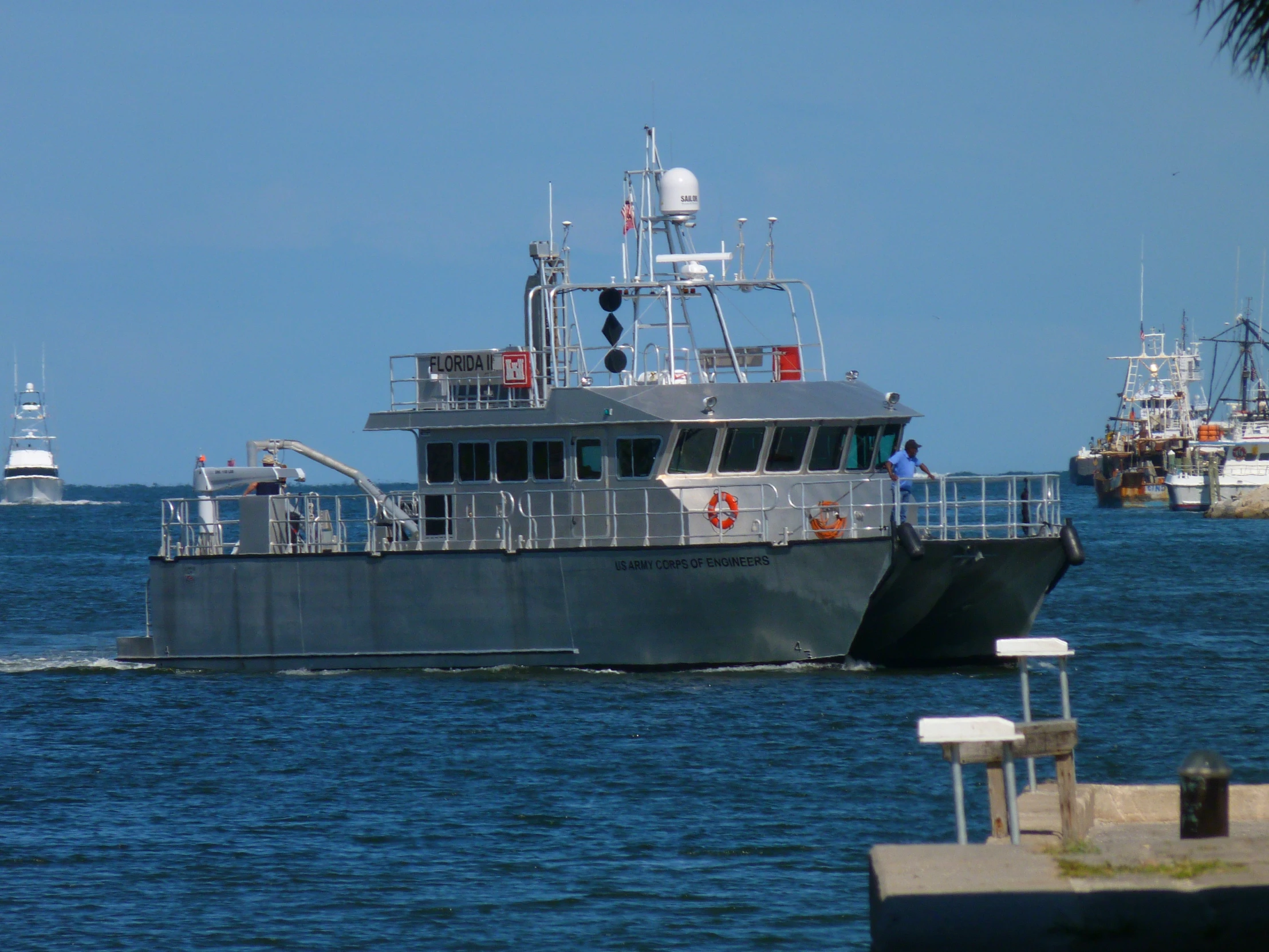 two large boats in the water near each other