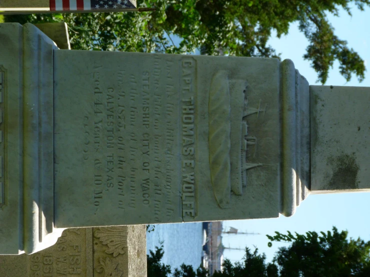 a monument with an american flag on it