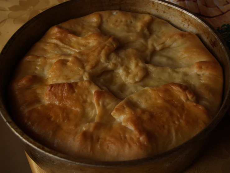 a pot filled with some bread and er