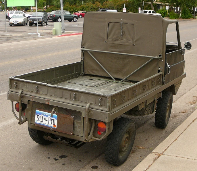 a pick up truck parked on the side of the road