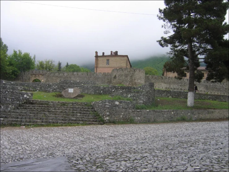 a street that has stone steps going up to a building