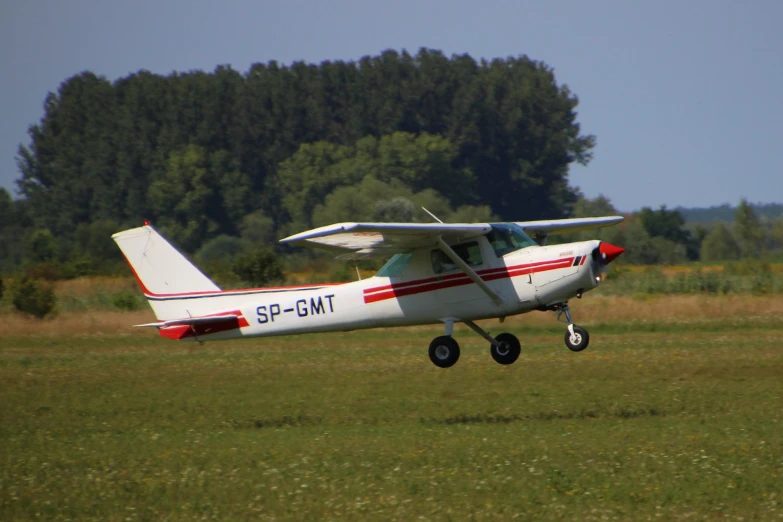 a small propellor airplane is ready for takeoff