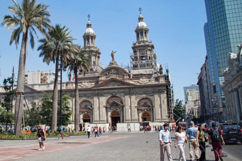 a very large building with towers on it's sides