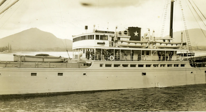 an old po of a big ship in the ocean