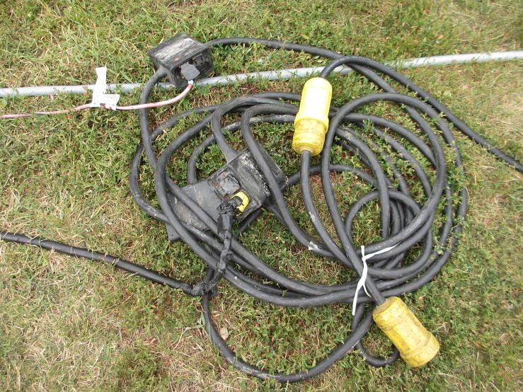 a power cord connected to a garden hose