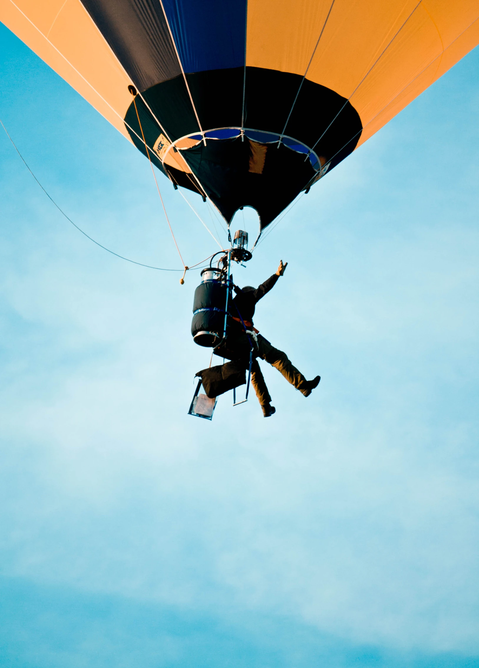 a  air balloon that is flying high in the sky