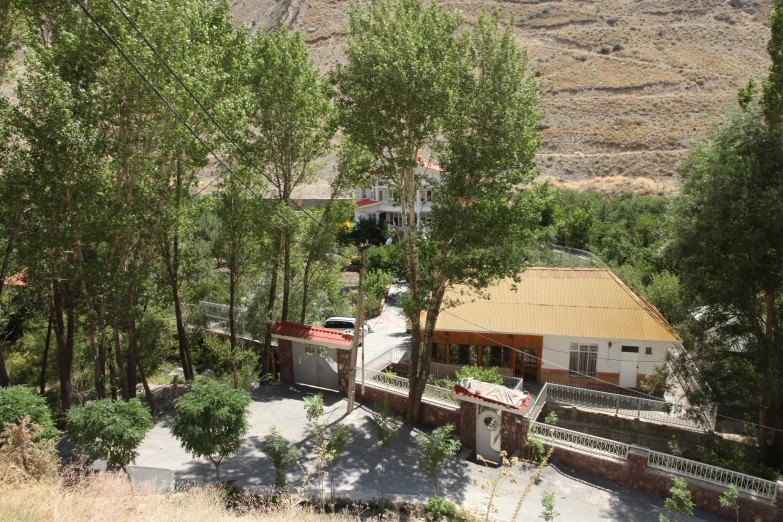 a house and several trees in a yard