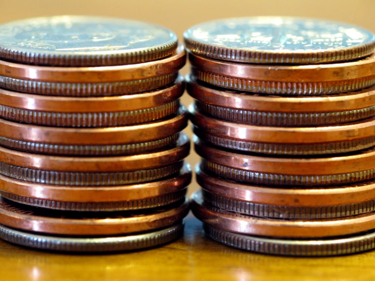 the coins are stacked on top of each other