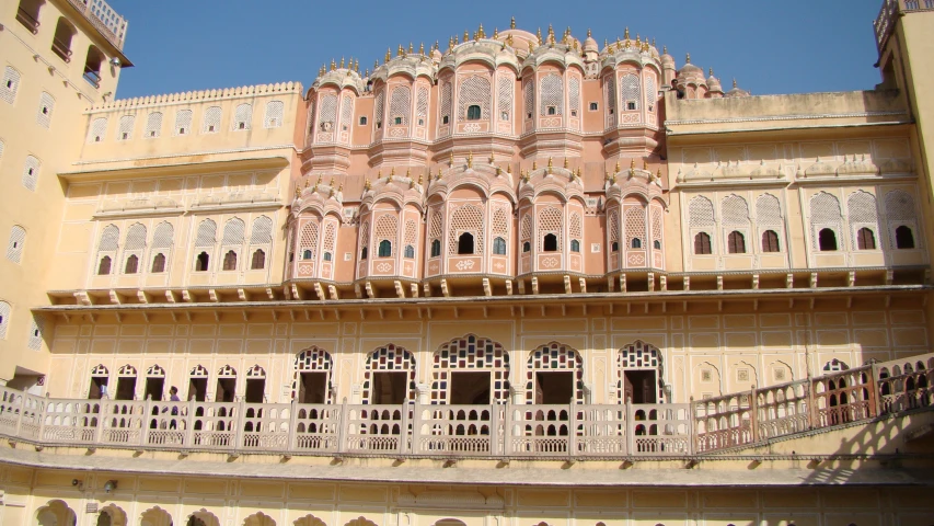 a very ornate building with a balcony and balcony