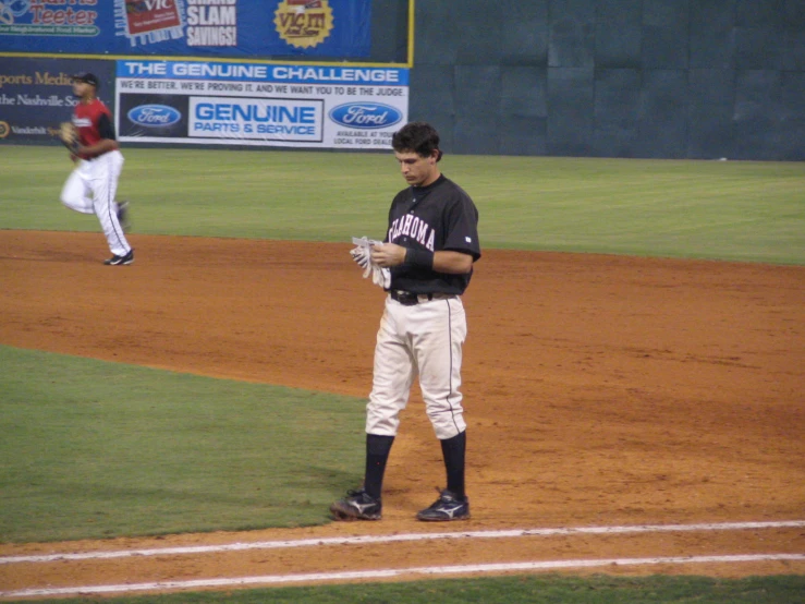 a baseball player waits for the next pitch
