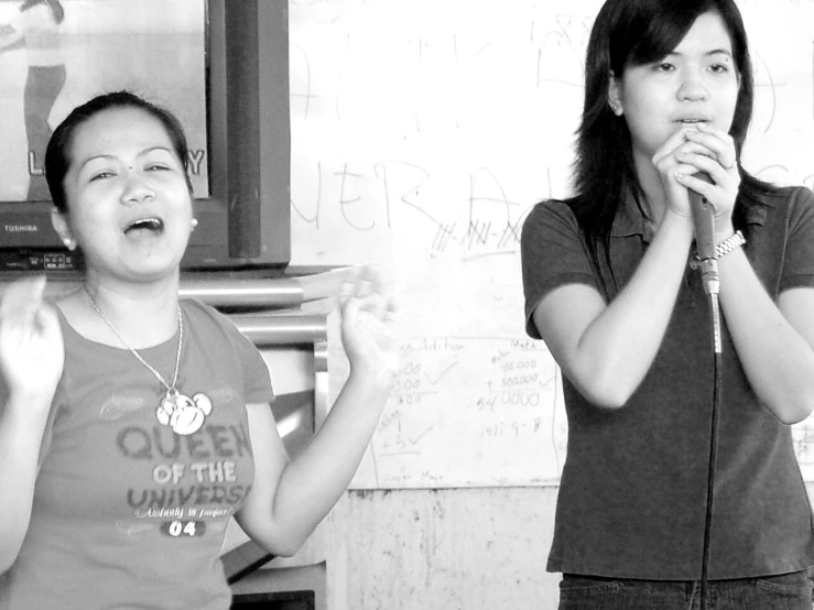 an image of a pair of women singing