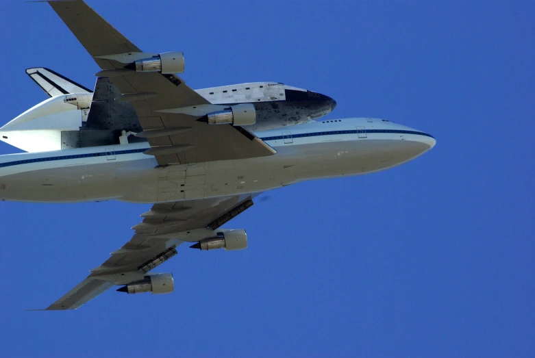 an airplane with an enclosed section above the engine