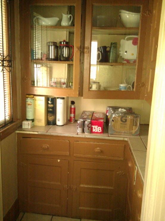 the cabinetry is neatly organized in a house