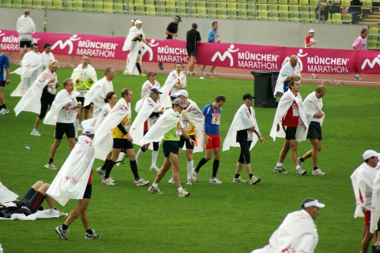 a large group of people in white robes