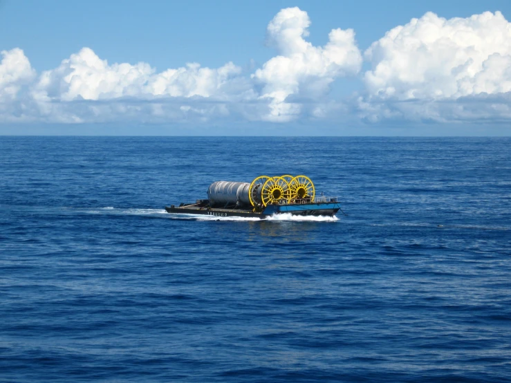 the small raft is floating in the open ocean