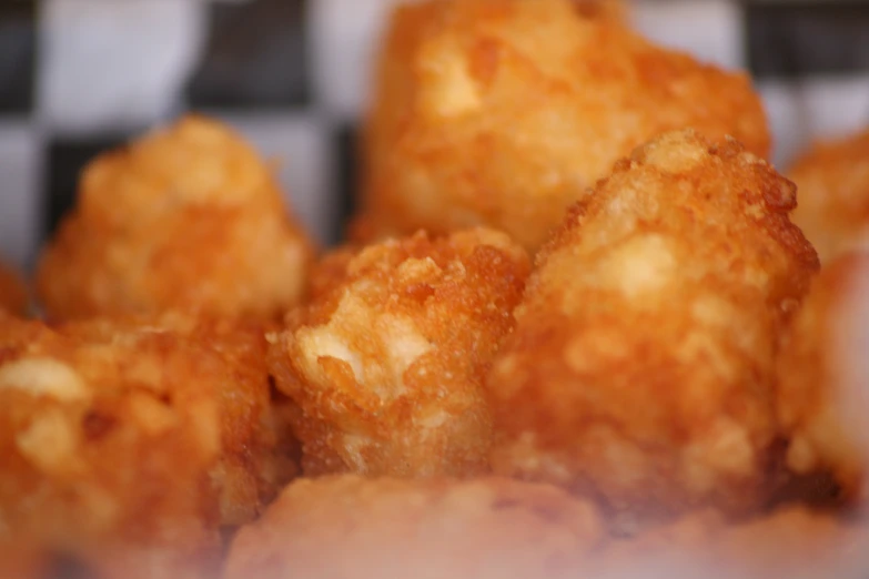 close up po of a basket filled with fried food