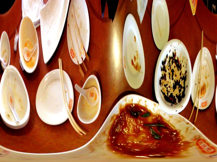 various food items are on a brown table