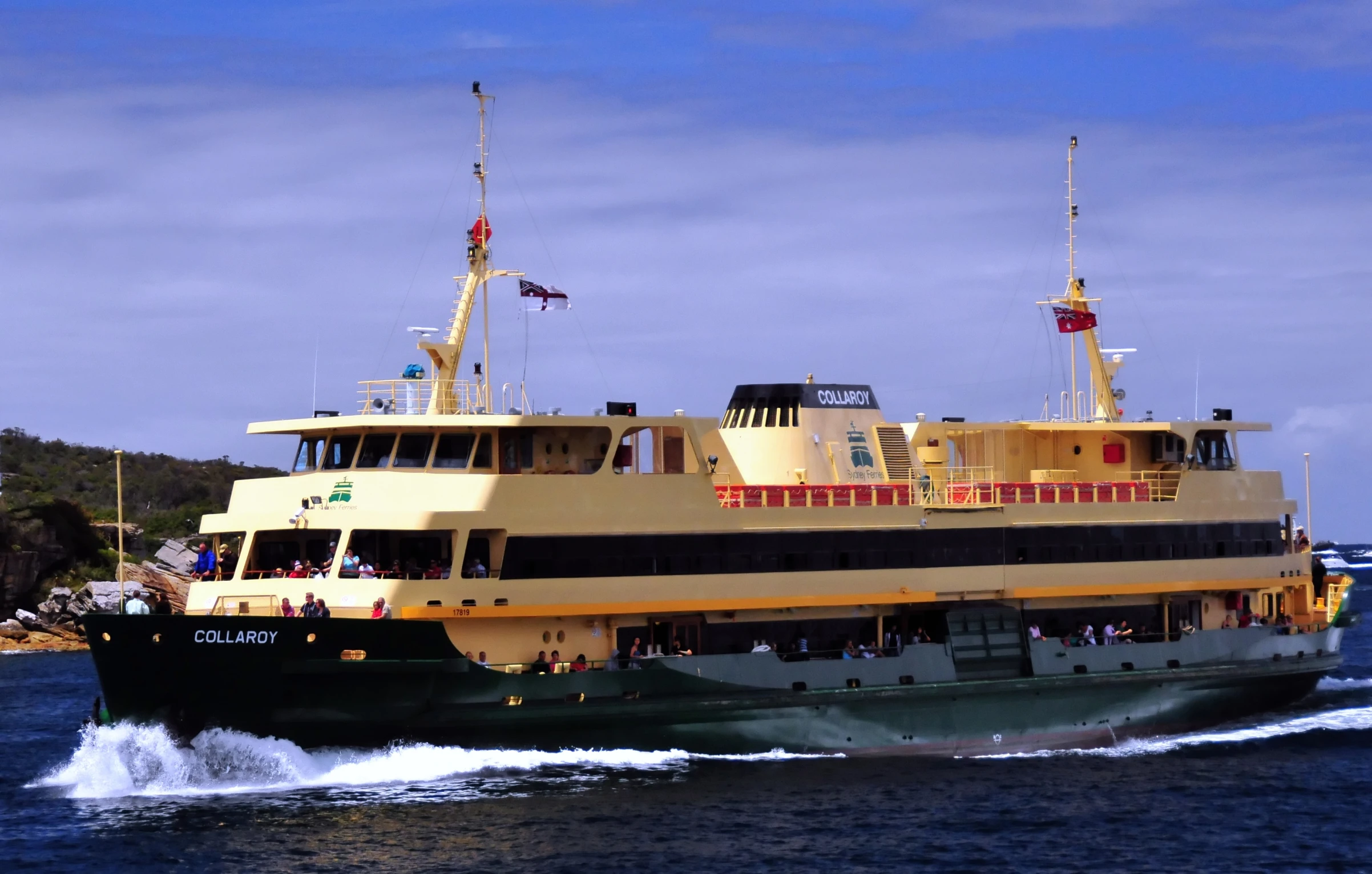 this is a large ferry boat driving on water