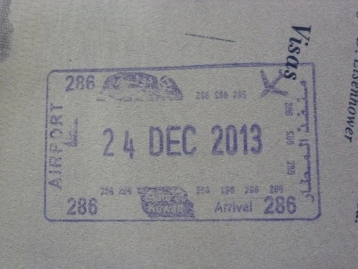 a passport stamp has been placed on the front of a white shirt