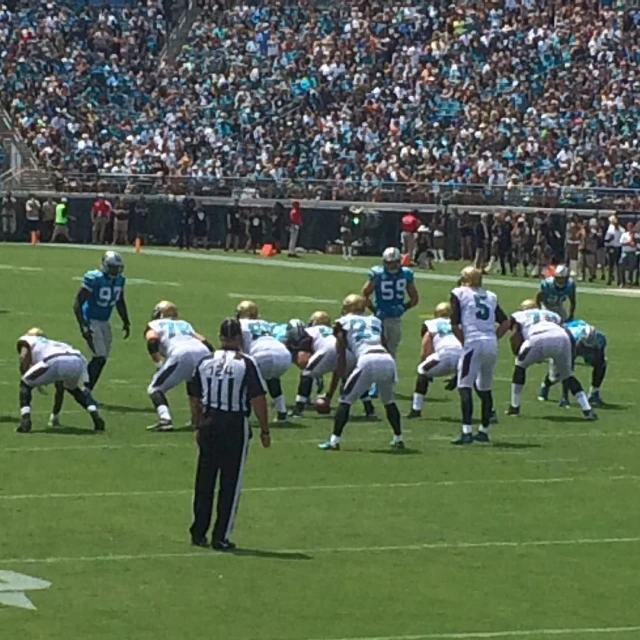 a group of football players on the field