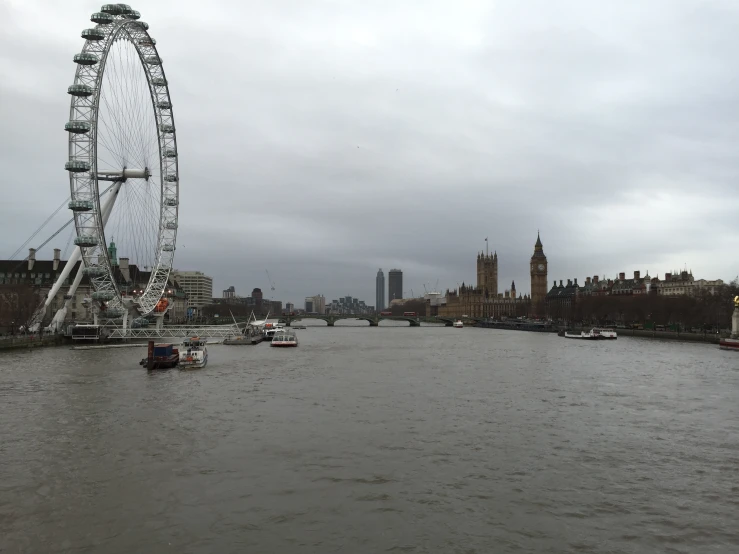 the river is not very wide but it has ferris wheels