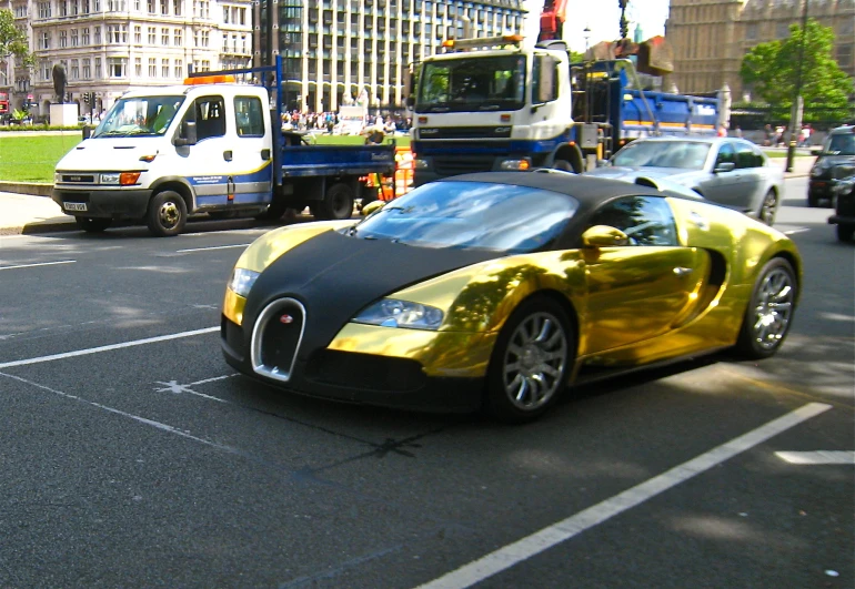 a yellow buggy sitting on the side of a road