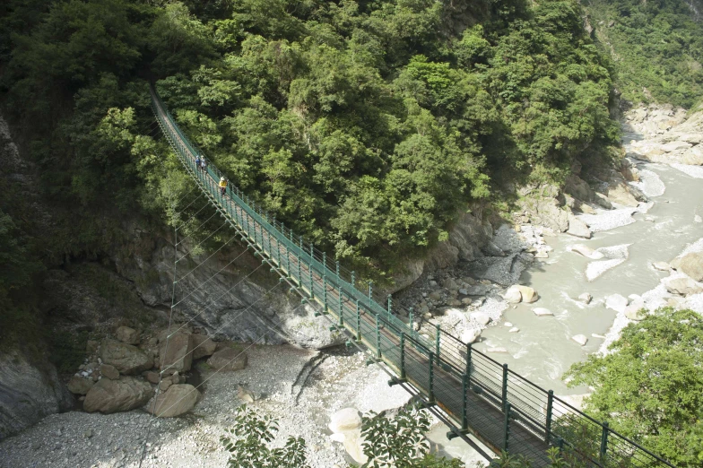 the suspended bridge over the river is very scenic