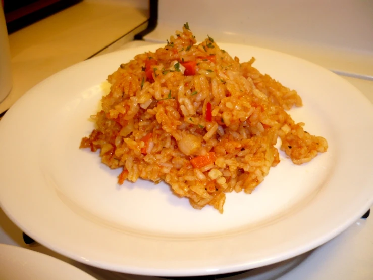 rice and vegetables mixed on a plate ready to eat