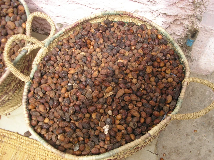 a basket full of food next to another one