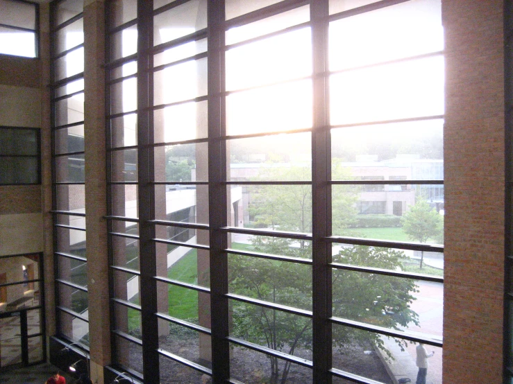 the view from inside of a building that's being viewed through some windows