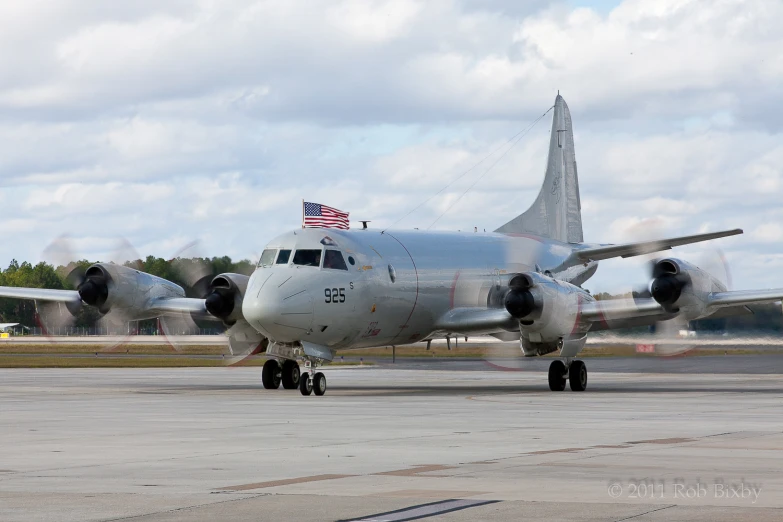 a large air plane taking off from an airport runway