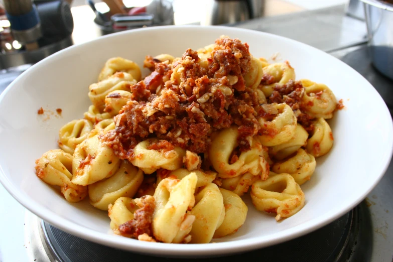 a bowl that has some type of pasta in it